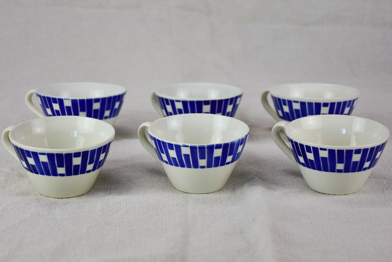 Set of 14 mid century coffee cups with blue and red pattern