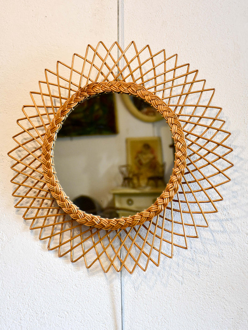 Vintage sunburst mirror with rattan frame