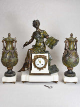 Napoleon III mantle clock with matching ornamental urns