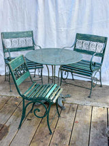 Antique Parisian garden table with three chairs - green