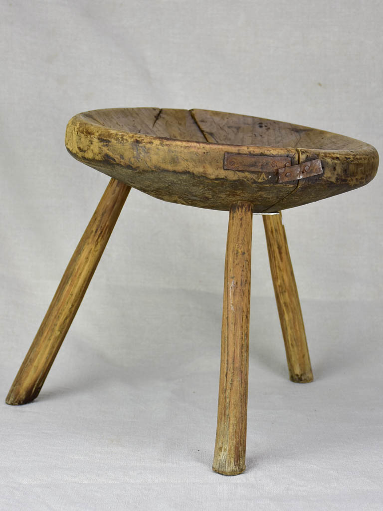 Antique French primitive milking stool with repairs