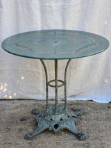 Antique Parisian garden table with three chairs - green