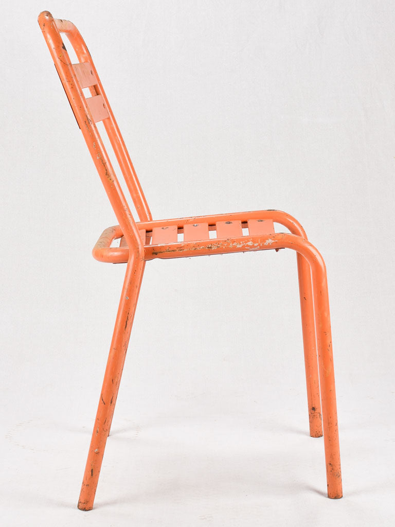 Set of 10 Tolix chairs from the 1950s with orange patina