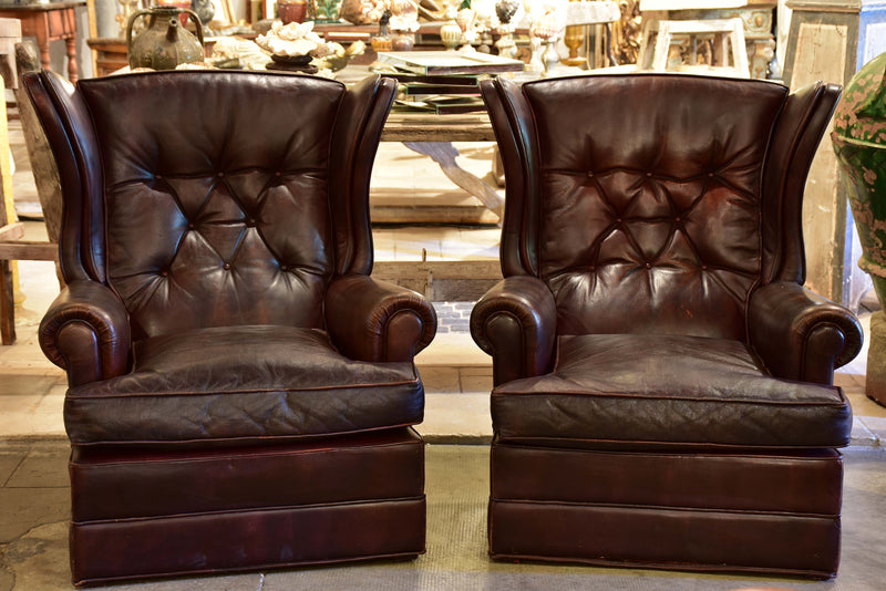 Pair of 1950’s leather wingback armchairs