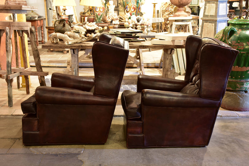Pair of 1950’s leather wingback armchairs