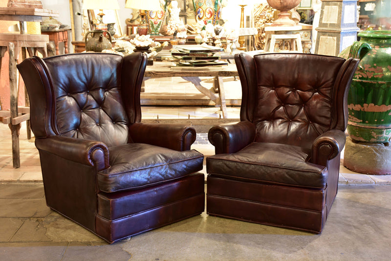 Pair of 1950’s leather wingback armchairs