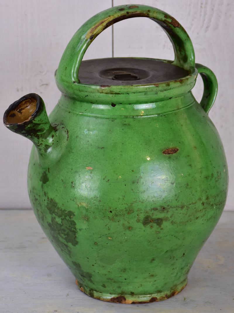Antique French waterjug with green glaze and lid