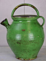 Antique French waterjug with green glaze and lid