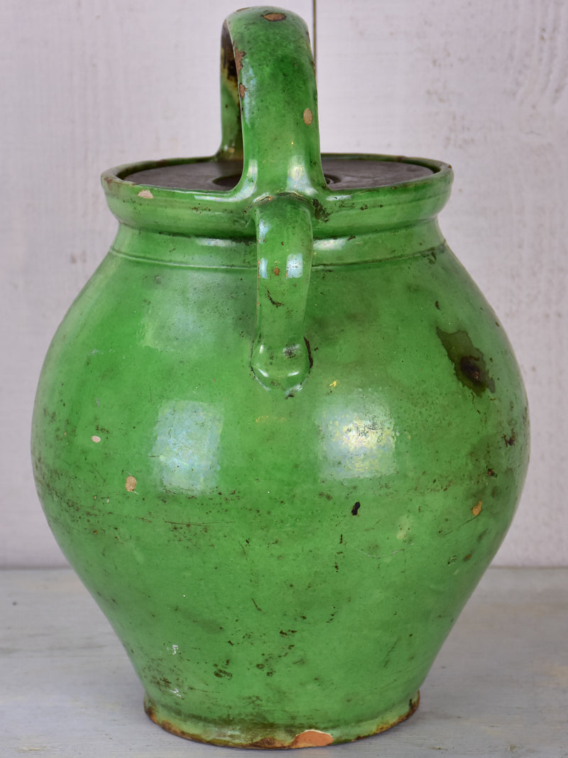 Antique French waterjug with green glaze and lid