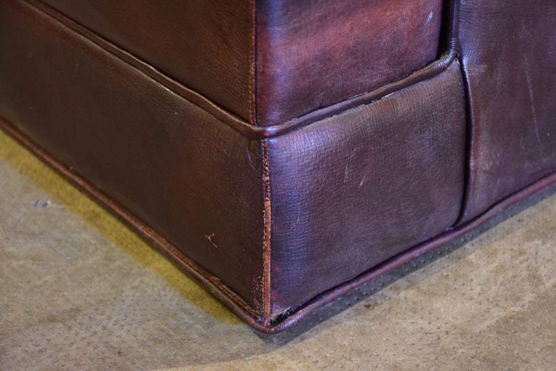 Pair of 1950’s leather wingback armchairs