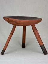 Antique French primitive milking stool with burgundy red paint finish