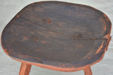 Antique French primitive milking stool with burgundy red paint finish