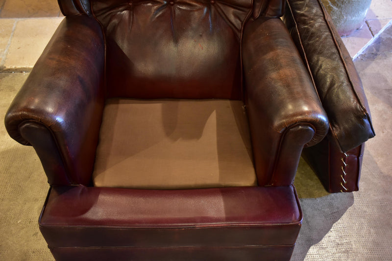 Pair of 1950’s leather wingback armchairs