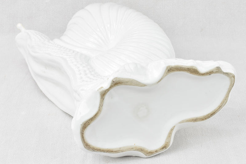 Artistic vintage white snail-shaped vase