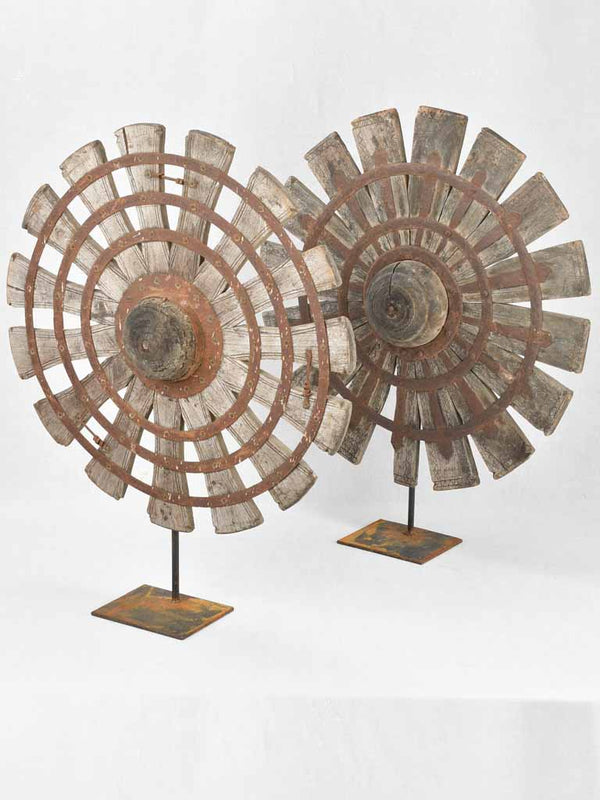 Pair of wooden sunburst sculptures 26½"