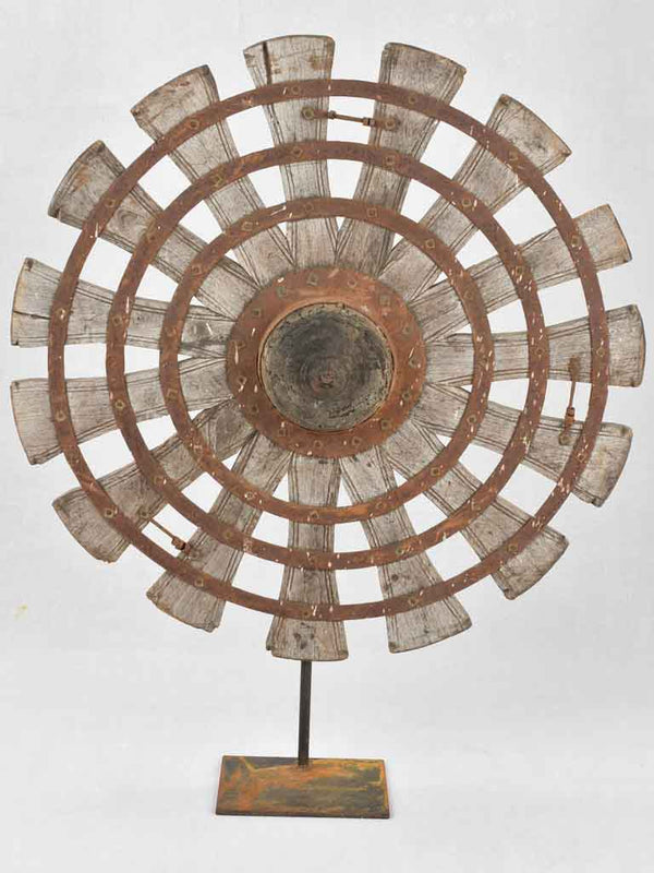 Pair of wooden sunburst sculptures 26½"