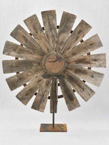 Minimalist industrial wooden sunburst sculptures