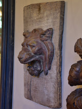 Mounted antique cast iron lion’s head