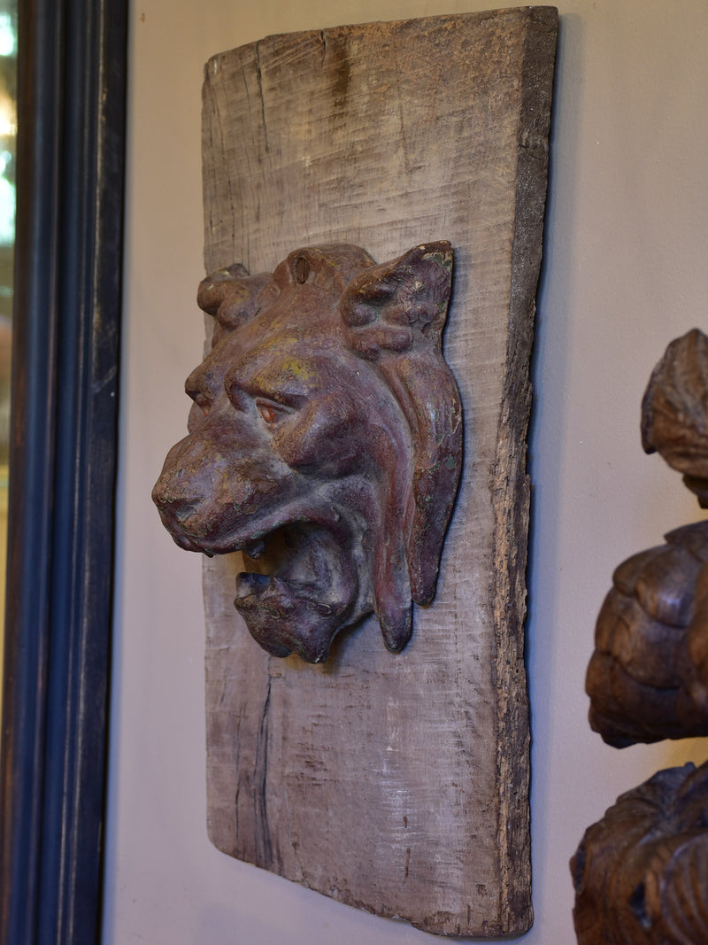 Mounted antique cast iron lion’s head