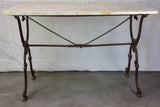 Late nineteenth century French marble presentation table with cast iron base 23¾" x  40½"