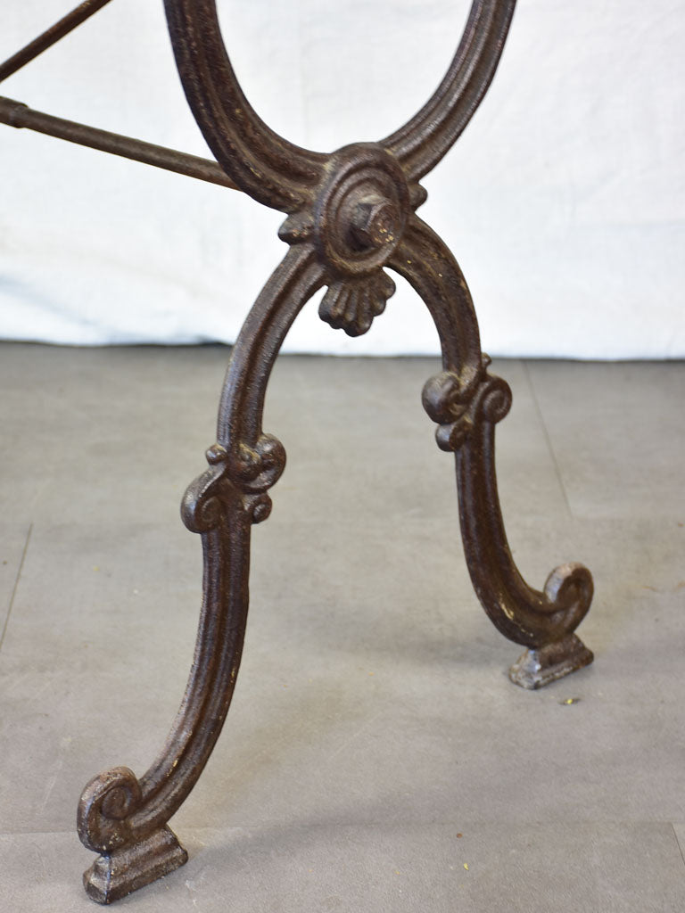 Late nineteenth century French marble presentation table with cast iron base 23¾" x  40½"