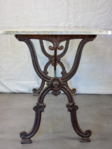 Late nineteenth century French marble presentation table with cast iron base 23¾" x  40½"