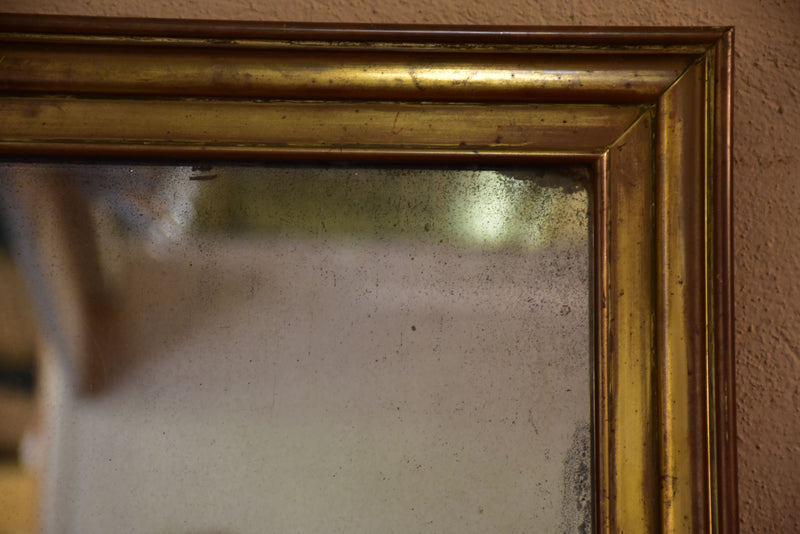 Antique French bistro mirror with brass frame