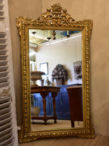 Antique French Regence mirror with gilded frame