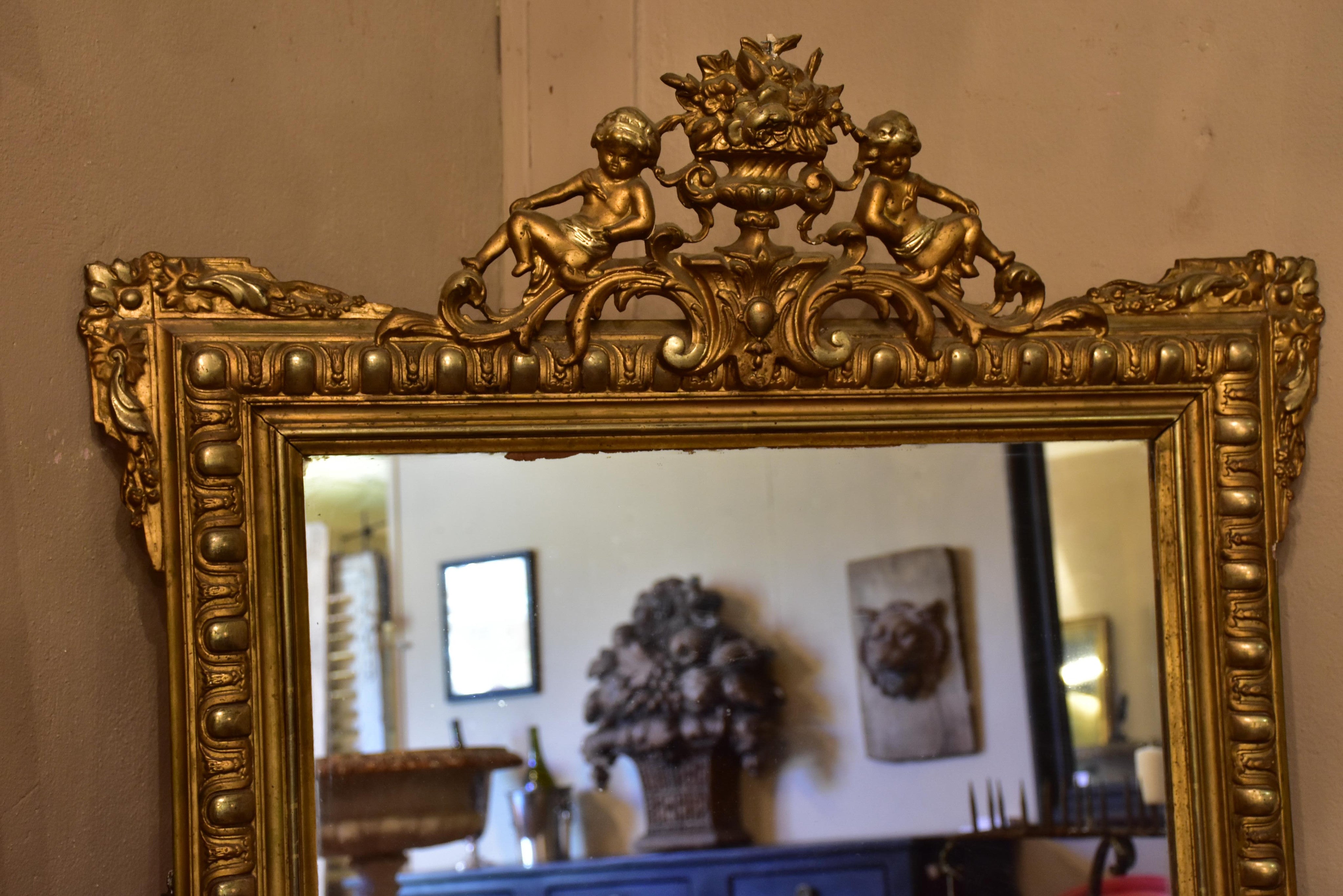 Antique French Regence mirror with gilded frame