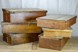 Collection of six large antique wooden boxes from a fabric boutique