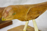 Three antique French primitive wooden sculptures of birds