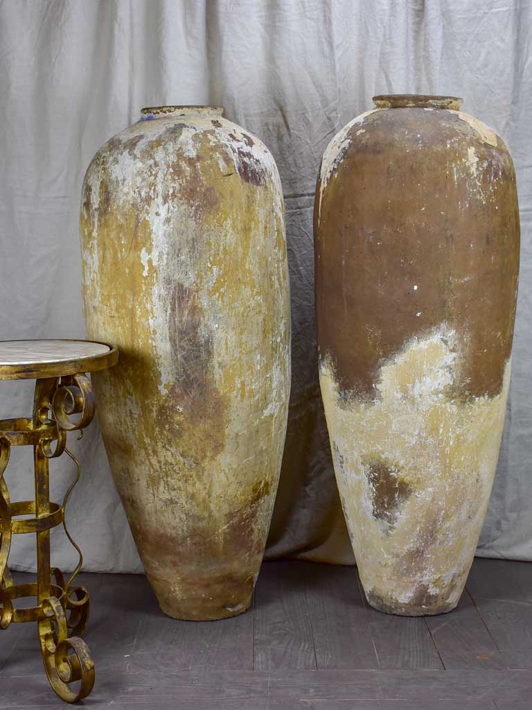 Pair of very tall antique Greek water pots 49"