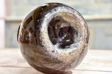 Small antique 'onion' bottle with dark green glass
