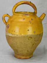 Antique French water cruche with yellow glaze
