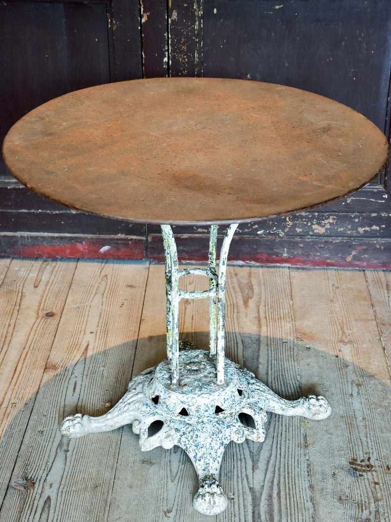 Early 20th century French garden table with claw feet