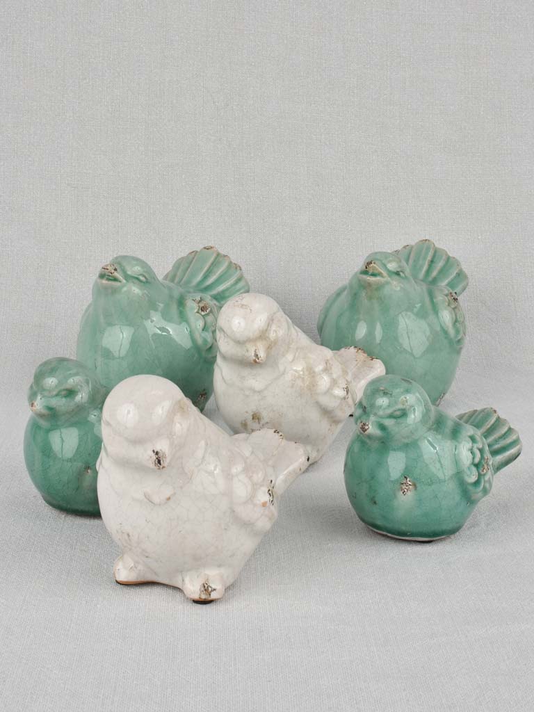 Collection of six blue and white ceramic birds