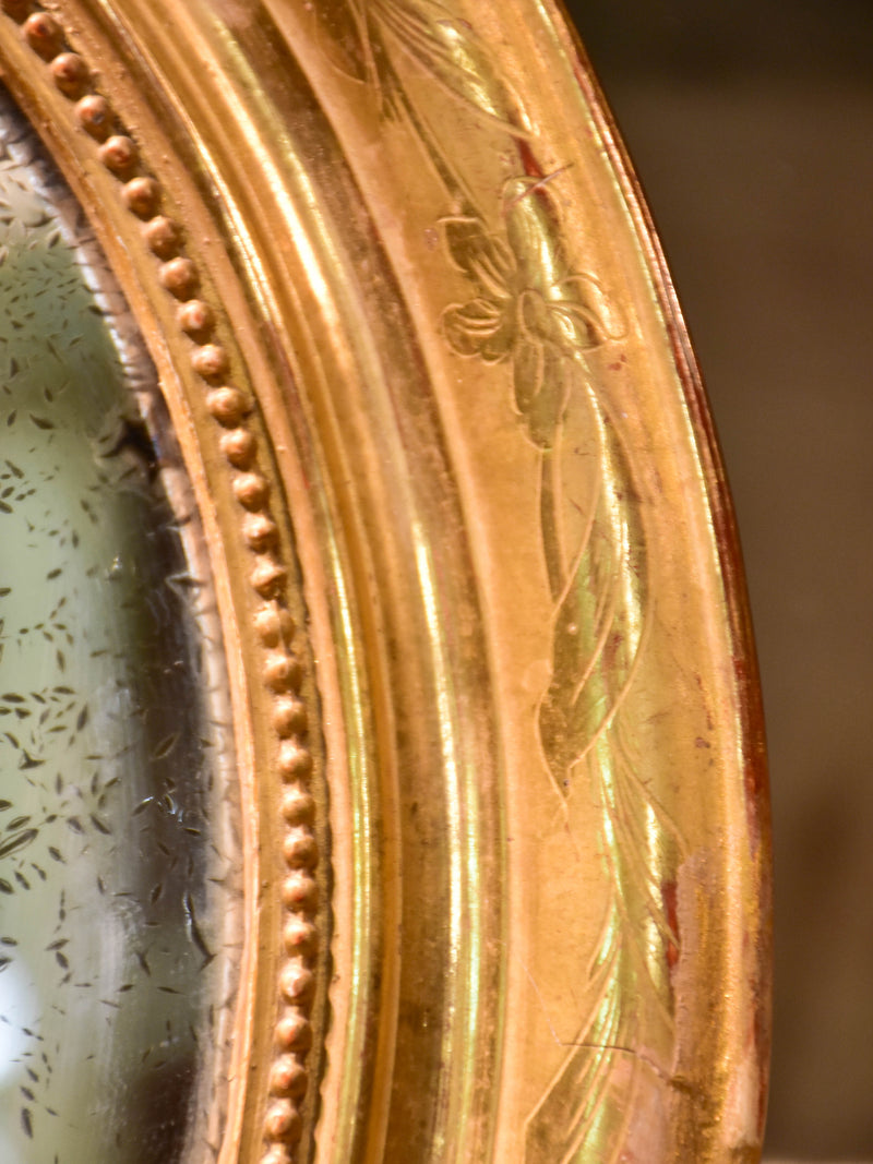 Mid-19th century oval Louis Philippe mirror