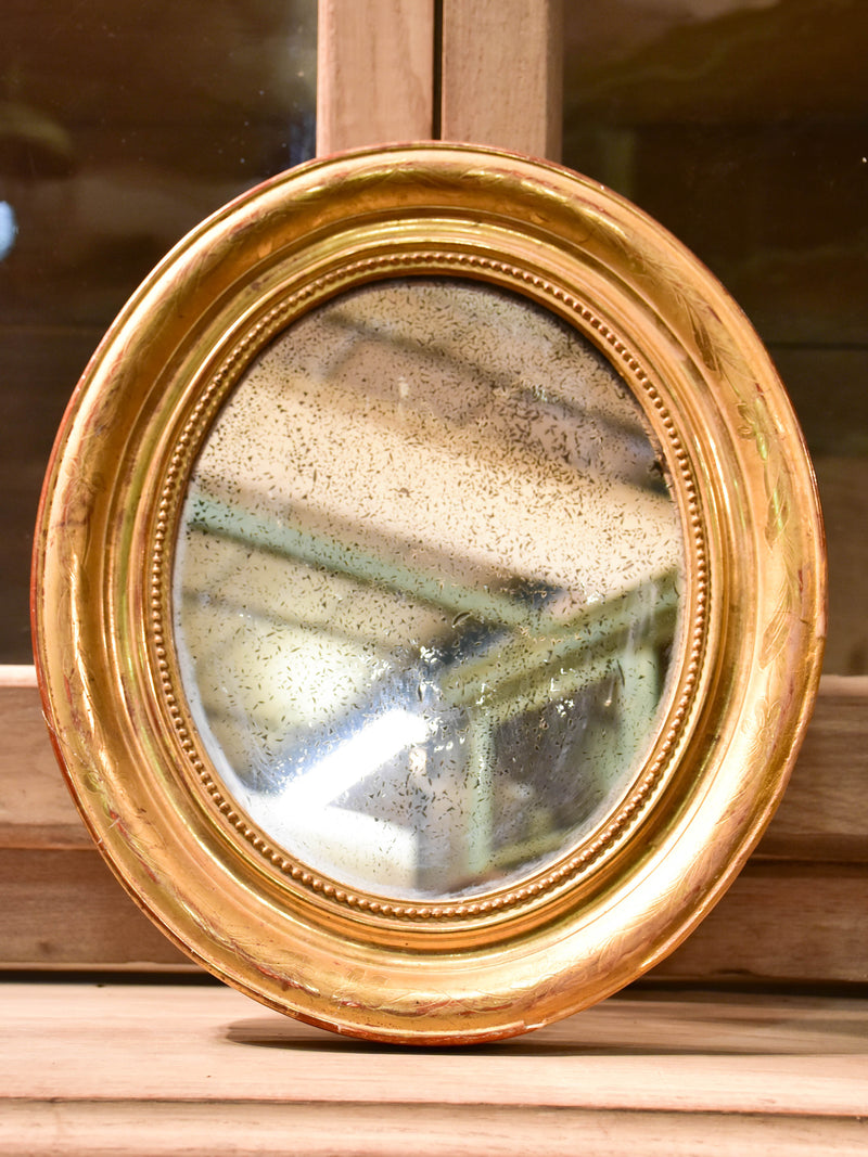 Mid-19th century oval Louis Philippe mirror