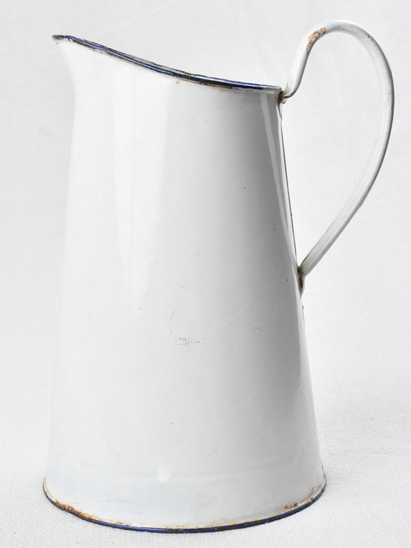 Vintage white enamel rustic pitcher