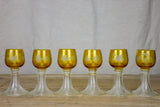 Six white wine glasses from Alsace with engraved decoration and broad ribbed bases
