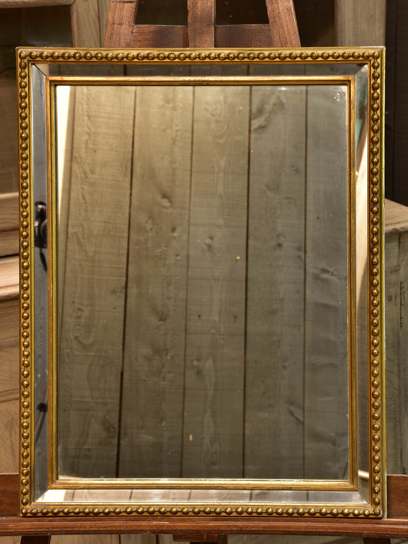 Late 19th century rectangular French mirror with large pearl border