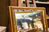 Late 19th century rectangular French mirror with large pearl border