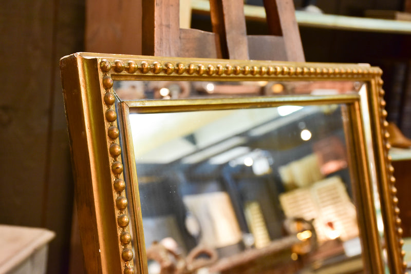 Late 19th century rectangular French mirror with large pearl border