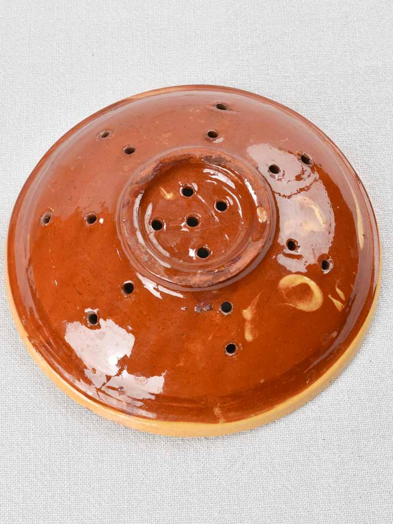 Traditional glazed ceramic strainer plate