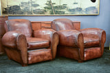 Pair of French leather club chairs with scroll back - pair one