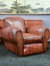 Pair of French leather club chairs with scroll back - pair one
