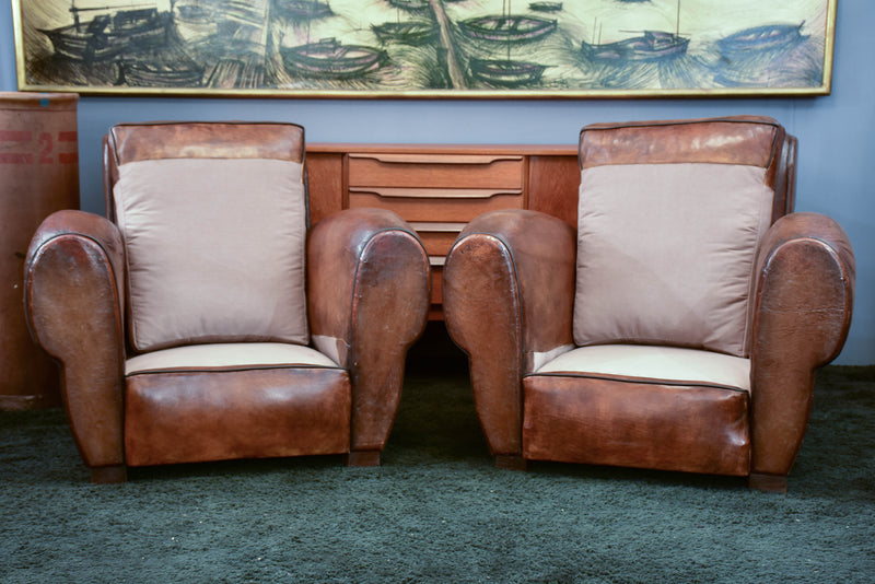 Pair of French leather club chairs with scroll back - pair two