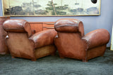 Pair of French leather club chairs with scroll back - pair two