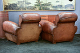 Pair of French leather club chairs with scroll back - pair two