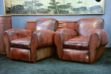 Pair of French leather club chairs with scroll back - pair two
